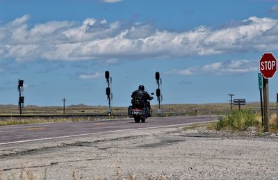 Biker on the two lane highway