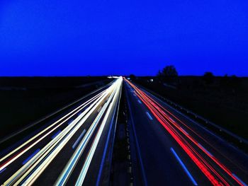 High angle view of light trails on highway