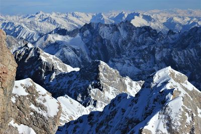 Scenic view of snowcapped mountains against sky