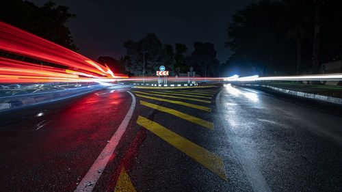 Light trails on road at night