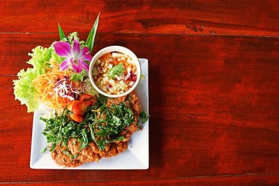 Directly above shot of food served on table