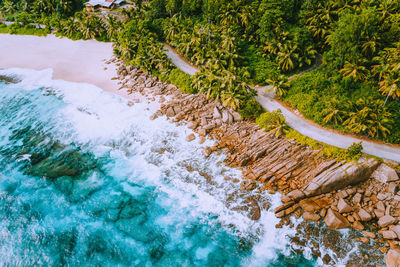 Aerial view of rock formation on beach