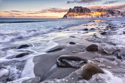 Scenic view of sea against sky during sunset