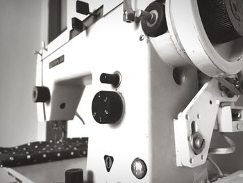 Low angle view of machine part in factory