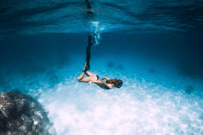 Man swimming in sea