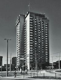 Low angle view of skyscraper against clear sky