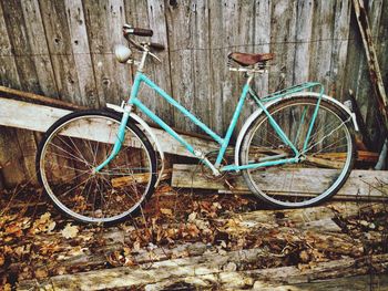 Bicycle parked against wall