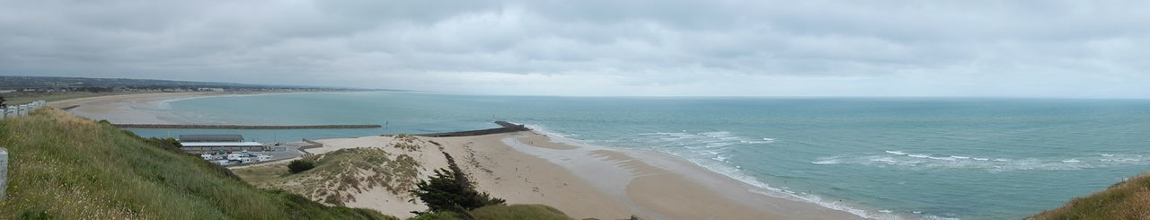 Panoramic view of beach against sky