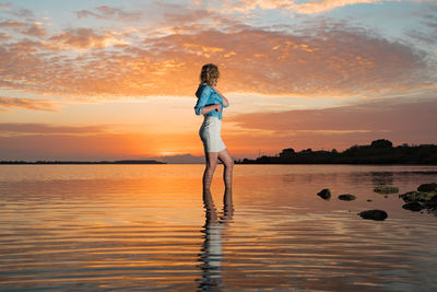 Full length of a man standing in lake