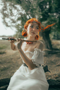 Young woman playing violin