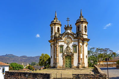 View of historic building against blue sky