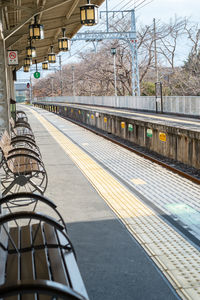 Empty benches at railroad station platform