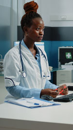 Doctor looking away in clinic