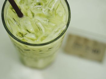 High angle view of drink in glass on table