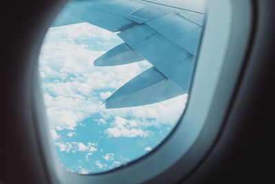 Aircraft wing seen through window