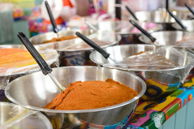 Close-up of spices in container on table