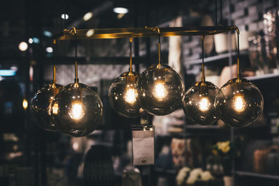 Close-up of illuminated pendant lights