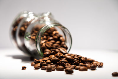 Close-up of coffee beans on table