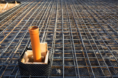 High angle view of metal grate