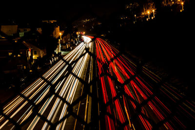 High angle view of light trails on city at night