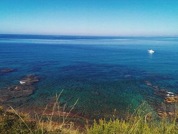 Scenic view of sea against clear sky