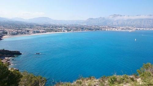 Scenic view of sea against blue sky