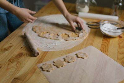 Young woman making christmas cookies