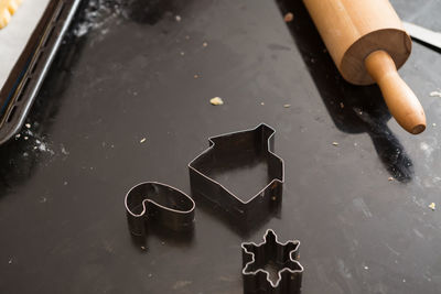 High angle view of kitchen utensils on marble