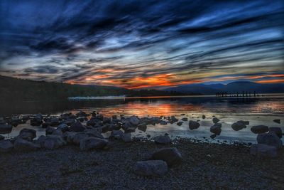 Scenic view of sea against sky at sunset