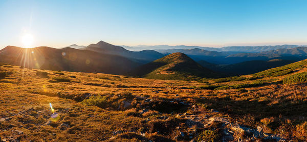 Scenic view of mountains against clear sky