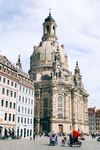 Group of people in front of building