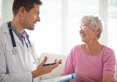 Doctor examining patient in medical clinic