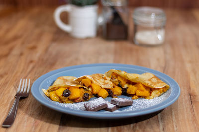 Close-up of breakfast served on table