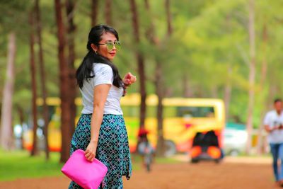 Woman walking on road