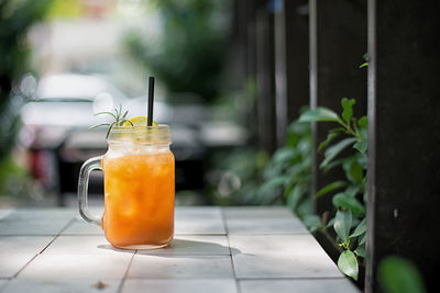 Close-up of cocktail drink in mason jar on table