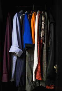 Picture of clothes hanging in the wardrobe