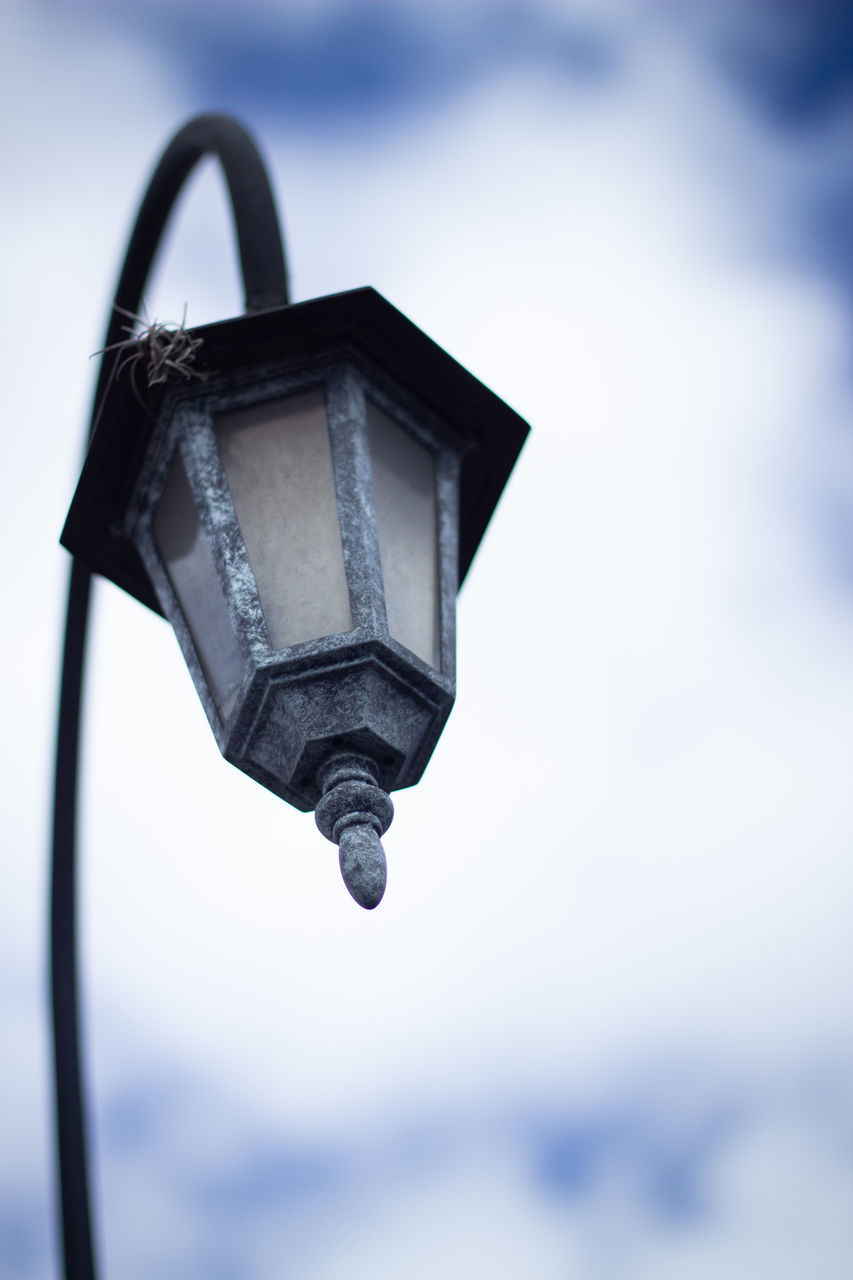 LOW ANGLE VIEW OF LAMP POST AGAINST SKY