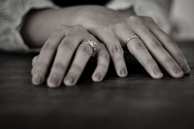 Cropped hands of woman wearing rings