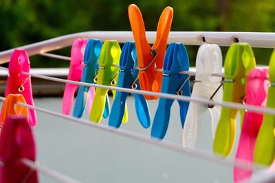 Close-up of multi colored clothespins on clotheslines