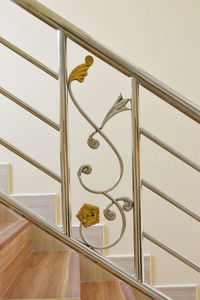 Close-up of metal railing on staircase