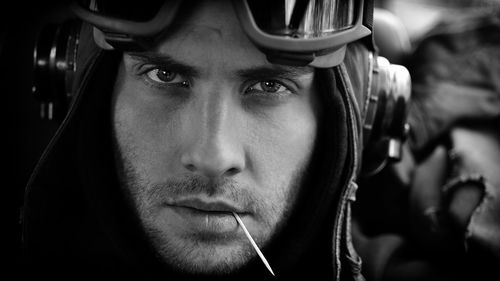 Close-up portrait of man wearing helmet