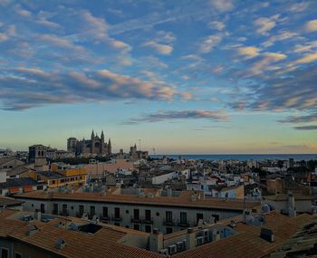 High angle view of townscape against sky during sunset