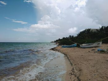 Scenic view of beach against sky