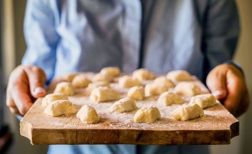 Close-up of man preparing food