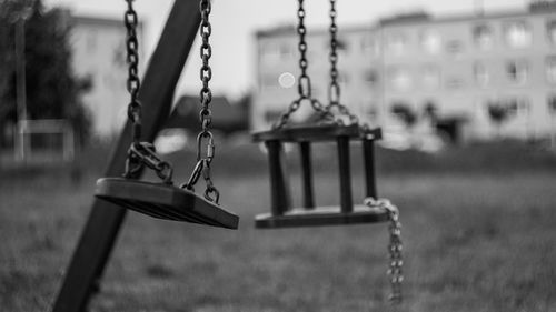 Close-up of swing at playground