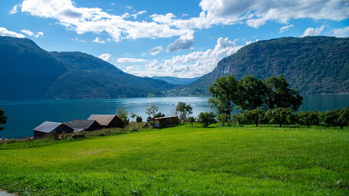 Scenic view of landscape and mountains against sky