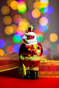 Close-up of illuminated christmas lights on table