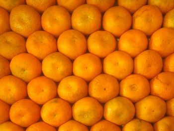 Full frame shot of oranges in market