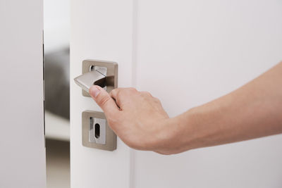 Woman open door and entrance in the room