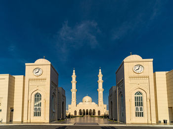 Facade of historic building against blue sky